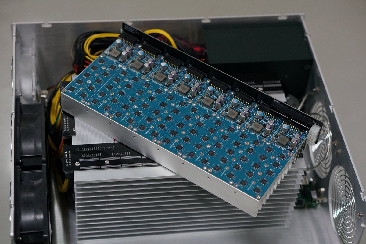 Avalon ASIC Bitcoin mining machine with its circuit boards exposed